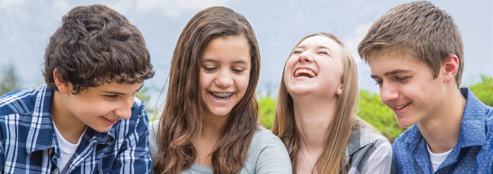 Students laugh together.